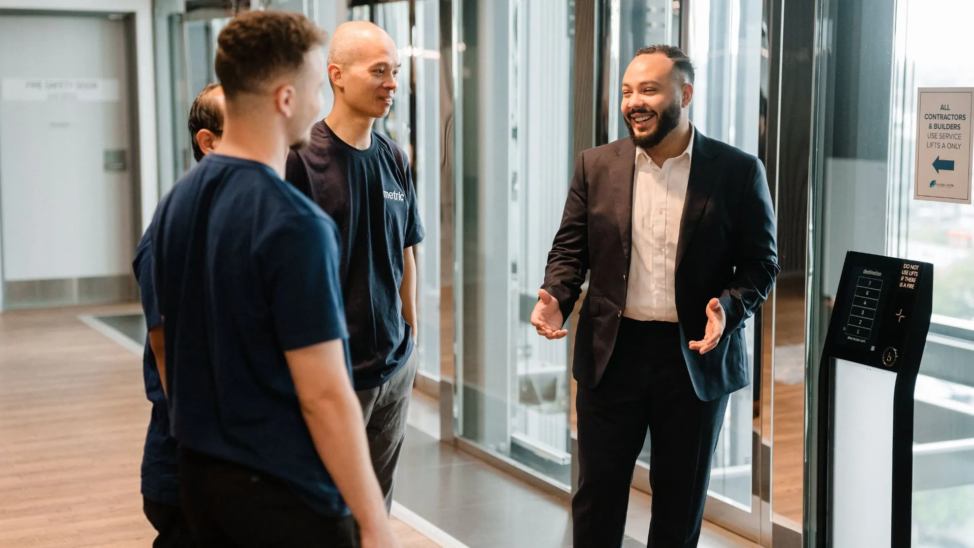 The Metric Engineering team in conversation at the office